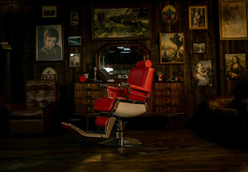 Red barber chair in low light