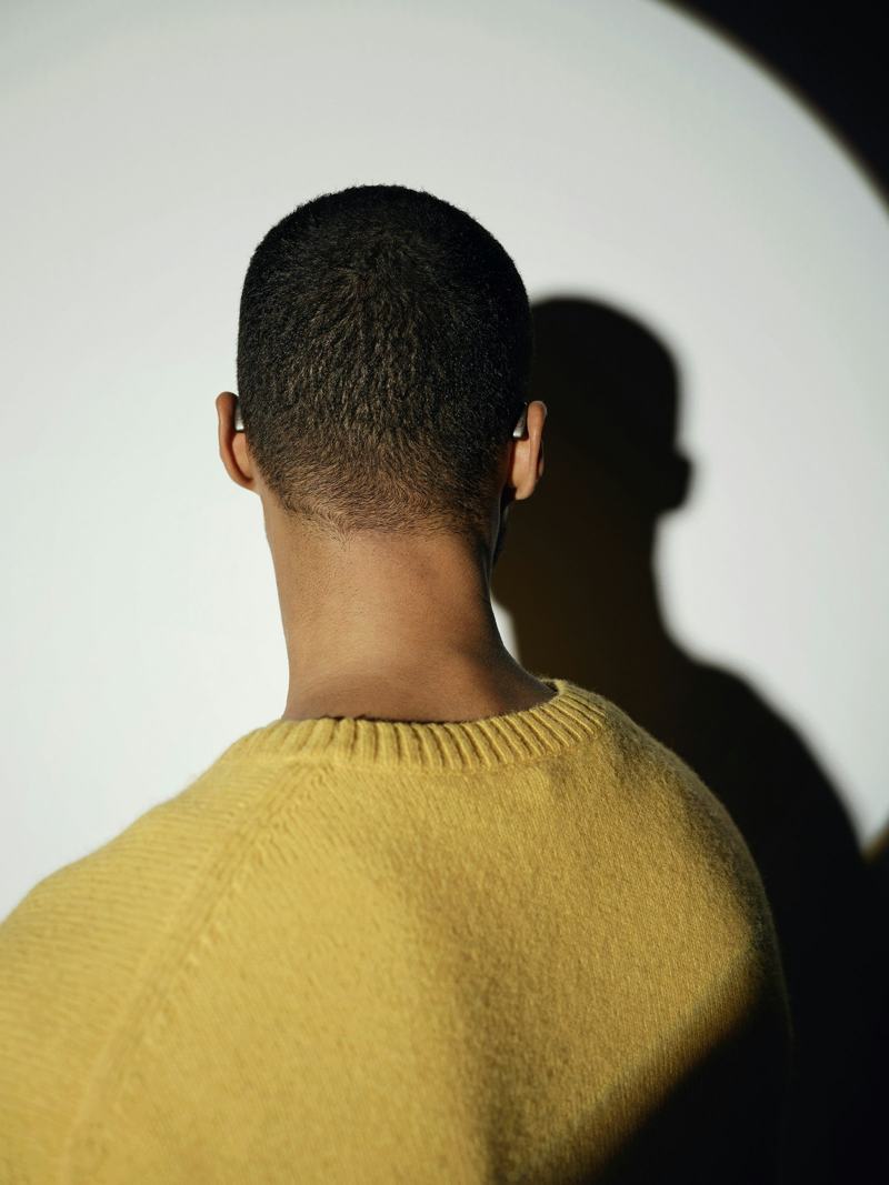 Back of a clean taper with a yellow sweater