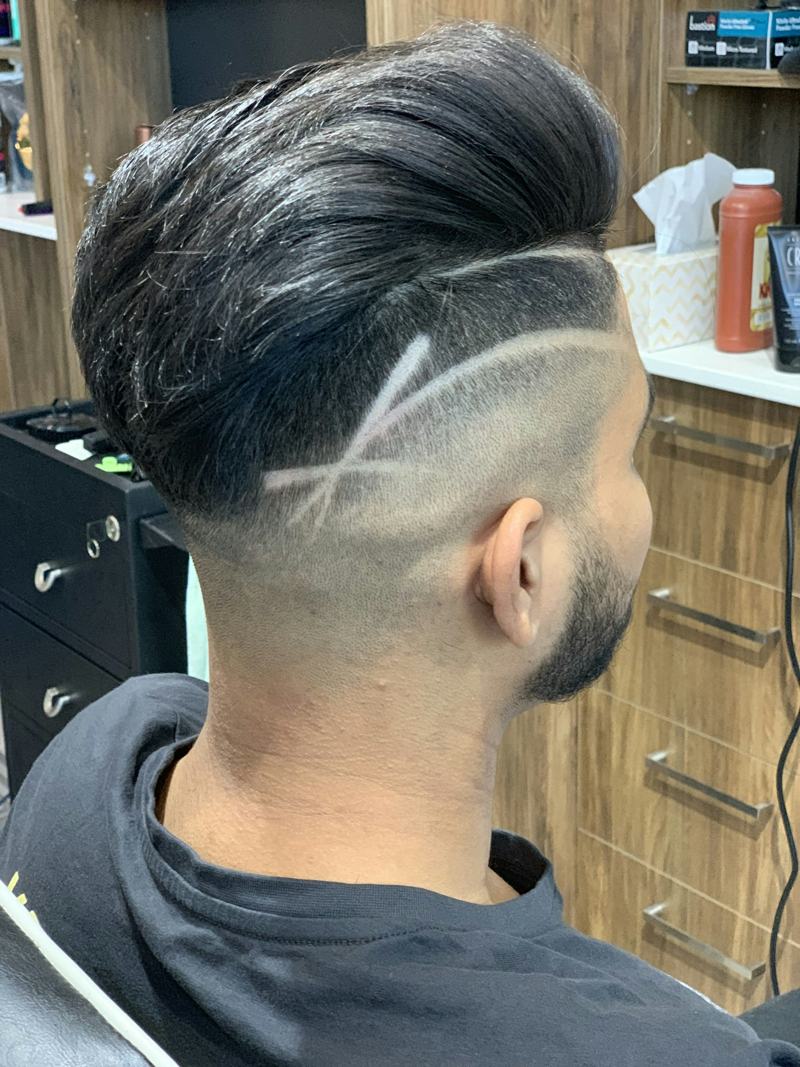 Skin fade with a freehand line design